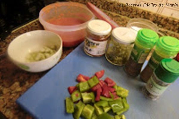 ingredientes para paella de conejo con hierbas aromáticas 